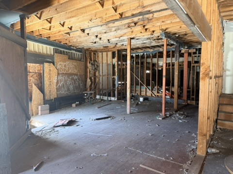 Wood floor still under it all