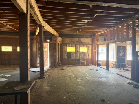 Curved beam and storefront